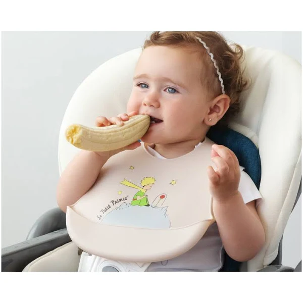 KIOKIDS BAVAGLINO SILICONE C/TASCA BEIGE IL PICCOLO PRINCIP